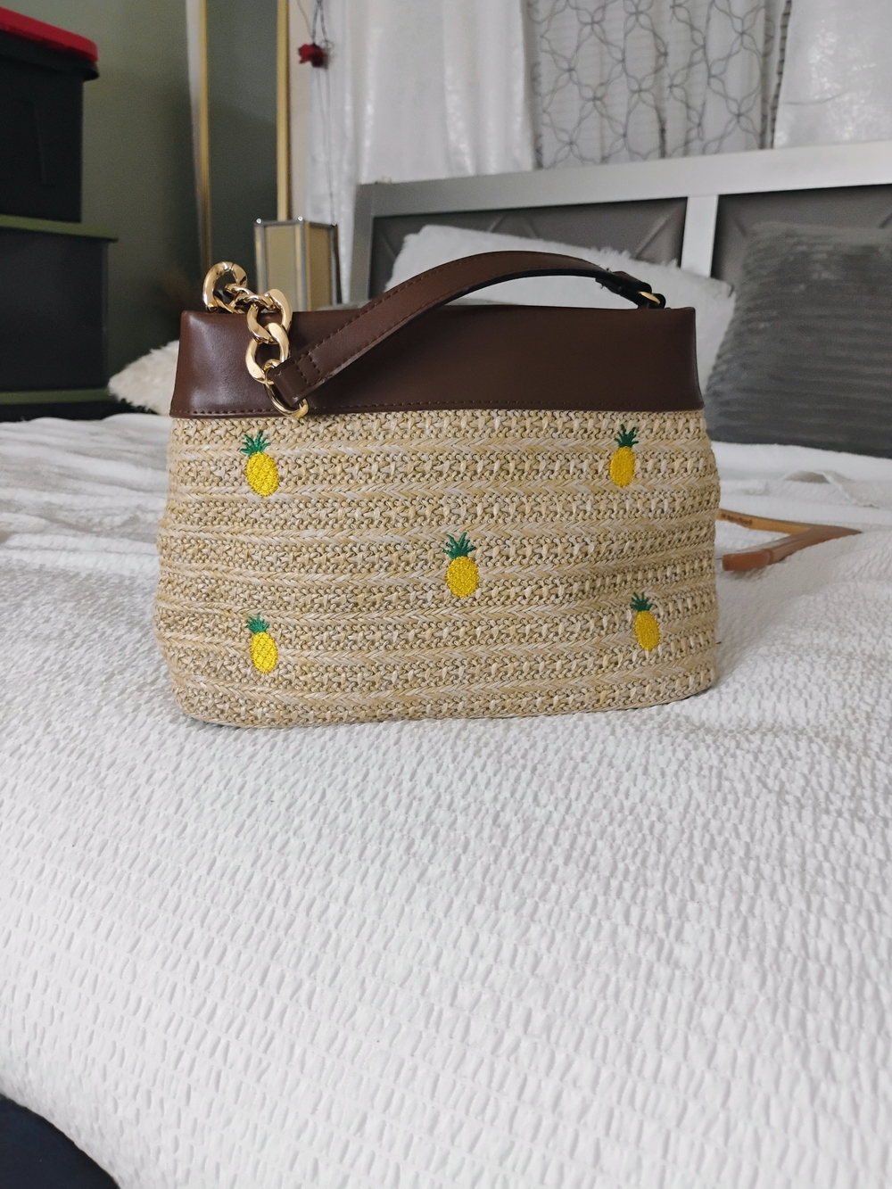 BCBGeneration Straw Shoulder Bag with Yellow Pineapple Embroidery and Brown Trim